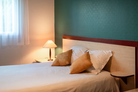 The sleeping area offers a comfortable place to unwind at the end of the day.