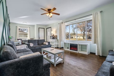 Electric fireplace for cozy nights and lots of seating to relax or visit