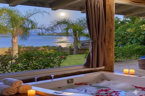 Premium Suite, Lanai, Beach View | Outdoor spa tub