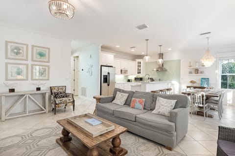 Spacious living area flows into the kitchen. Perfect for meals & together time.