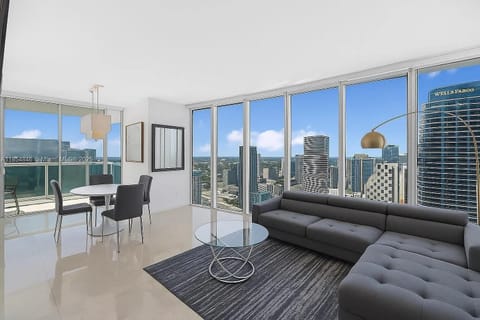 Bright, open-concept living area with breathtaking skyline views.