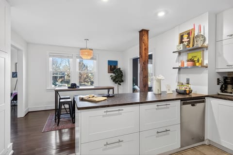 Bright, modern kitchen with stainless steel appliances, ample counter space, and everything you need to cook and gather with ease.