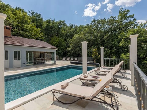 Swimming Pool, Composite Material, Estate, Resort, Outdoor Furniture, Shade, Water Feature, Landscaping, Villa, Patio