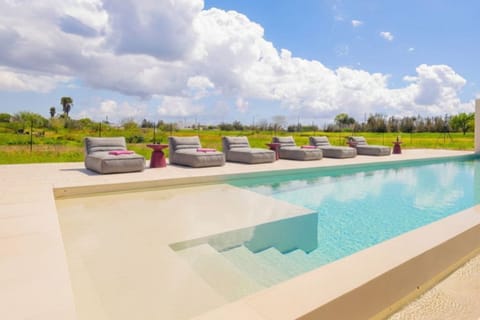 Private Pool with luxury sunbeds