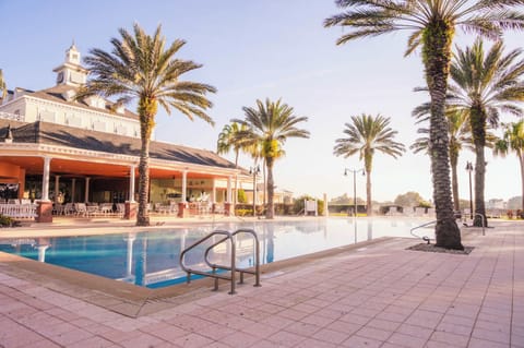 Zero-entry pool with pool bar and relaxed resort atmosphere.