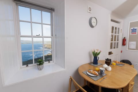 Dining area with coastal views