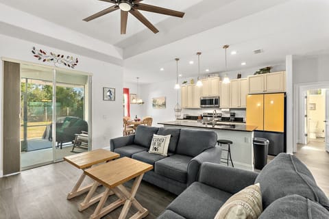 Spacious open-concept living area ideal for family time, meals, and relaxing evenings