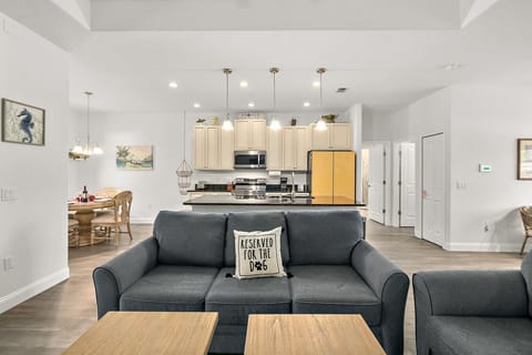 Spacious living area with open sightlines to the kitchen, ideal for families spending time together