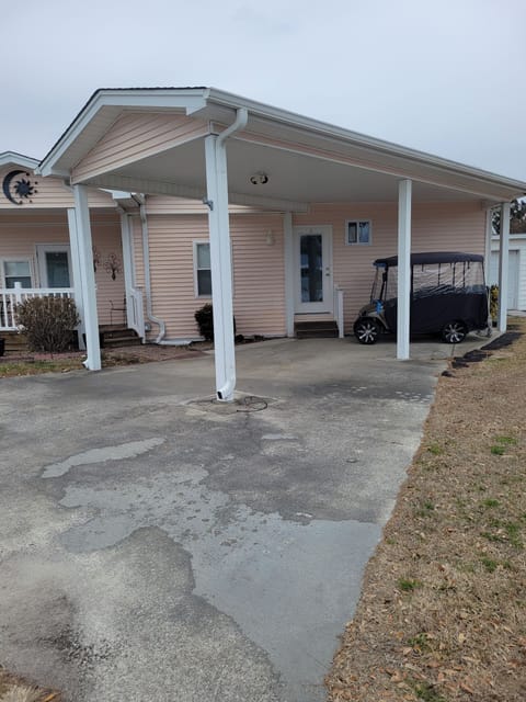 Front View Golf cart and car port