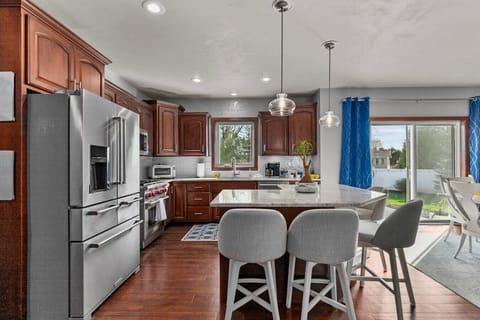 Whip up family feasts or quick snacks in our spacious kitchen, where functionality meets style for every culinary adventure.