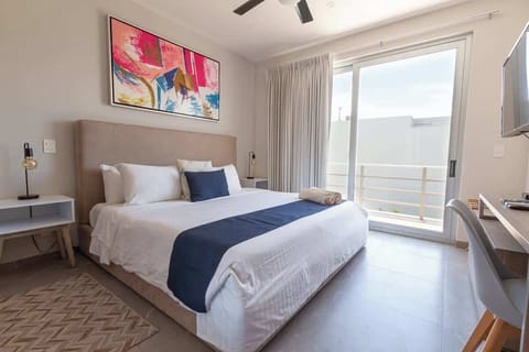 Stylish bedroom with king-size bed.