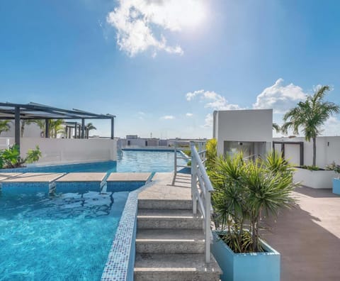 You choose whether to enjoy the sun on our rooftop or on the beach that is minutes away.