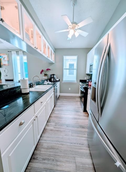 Bright, modern kitchen with New sleek stainless steel appliances