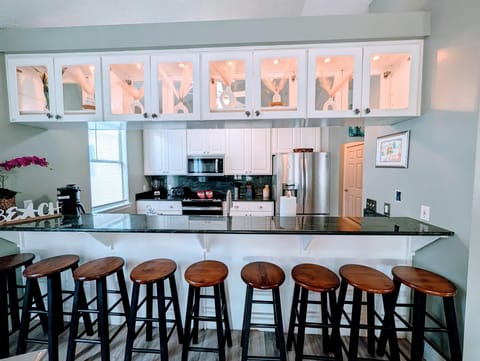 Bright, open kitchen with ample seating for gatherings