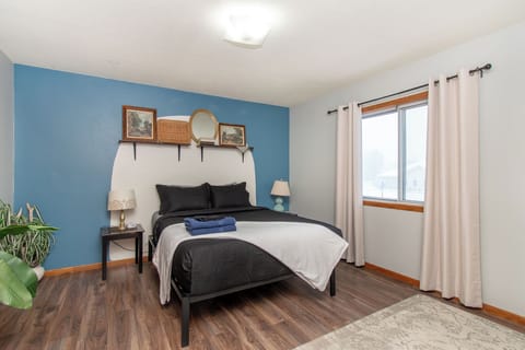 [Bedroom 1, second floor] Queen bed with convenient charging docks for your devi