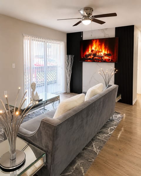 Executive Suite-Inspired Living Space 65 inch Smart TV & Custom Designer Wall
