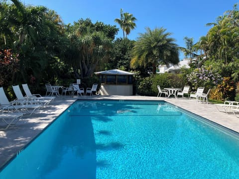 Shared heated pool with chairs