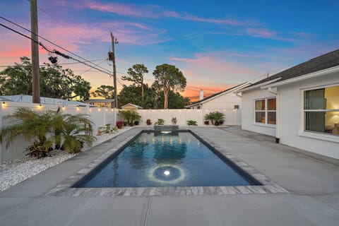 Enjoy a relaxing evening beside the pool as the sun goes down! (House 2)