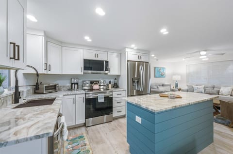 Bright, open, fully-equipped kitchen