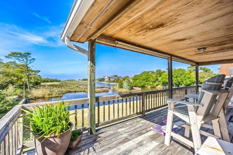 Back Deck: The back deck provides a relaxing place to sip morning coffee, watch boats drift by, or unwind as the sun sets over the sound.