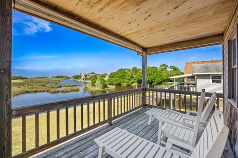 Back Deck: The back deck provides a relaxing place to sip morning coffee, watch boats drift by, or unwind as the sun sets over the sound.