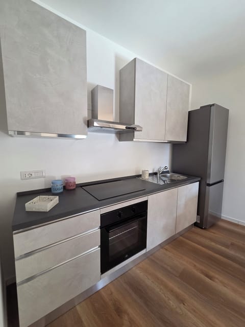 Apartment, Balcony, Courtyard View | Private kitchen | Espresso maker, coffee/tea maker, electric kettle, dining tables