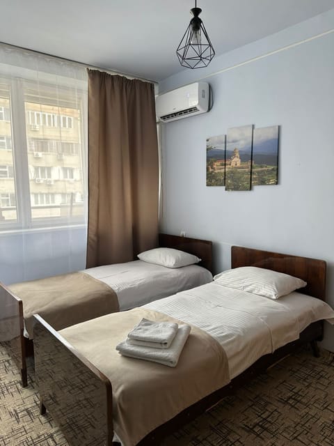Family Apartment, City View | Blackout drapes, soundproofing, iron/ironing board, free WiFi