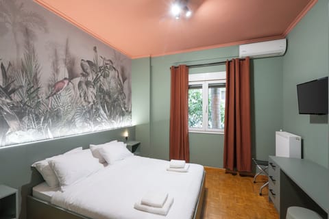 Design Apartment, Kitchen | In-room safe, individually decorated, individually furnished