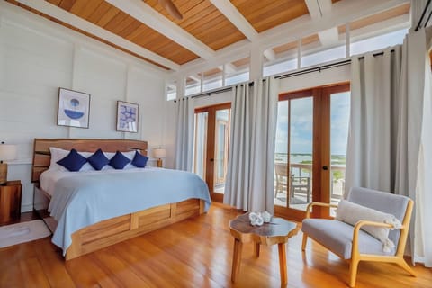 Wake up to ocean breezes in this sunlit king retreat.