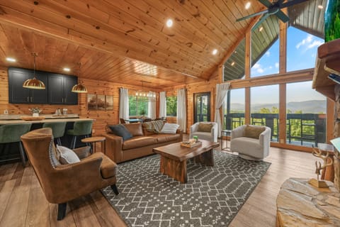 Living Room: Enjoy stunning mountain views in this airy, beautifully designed retreat!

