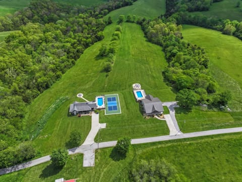 Take it in from the sky. Two full homes side by side give your crowd space to gather and space to breathe.