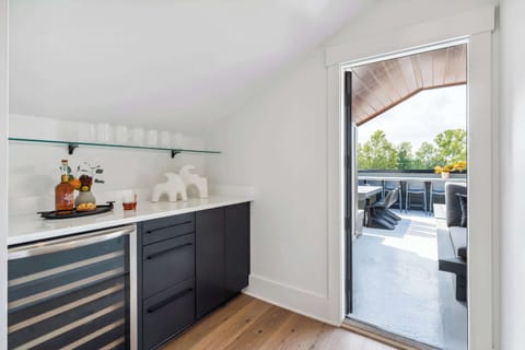 Hall Bar Area | Lounge Space Before Rooftop Access | Third Floor