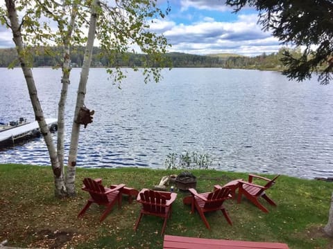 Fire pit and seating area on Lake Colby