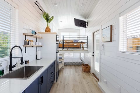 The fully equipped kitchen opens to the living and sleeping areas, making it easy to cook, relax, and enjoy your stay near Zion National Park in Southern Utah.
