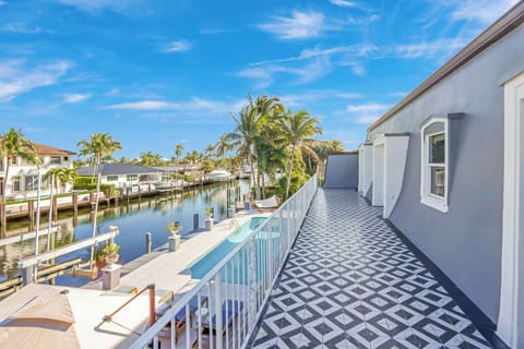 Balcony terrace accessible from primary, and guest bedrooms.