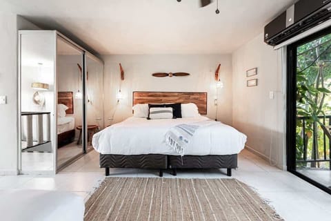 Bright bedroom with king bed and natural light