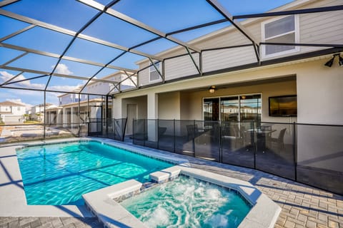 Private pool & spa, covered outdoor eating space, seating area with curtains and TV, complete with pool safety fence