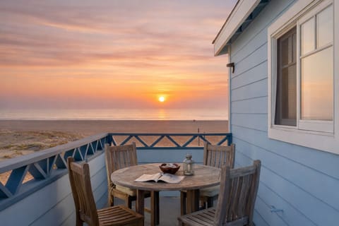 Private balcony dining with unobstructed ocean views.