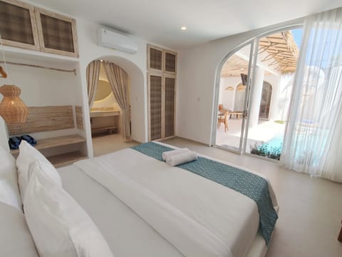 Villa, 2 Bedrooms, Patio, Pool View | Desk, laptop workspace, soundproofing, free WiFi