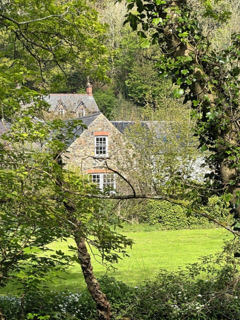 View from the river back to the original Pump  house at the Mill.