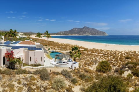 Aerial view of villa with incredible beachfront
