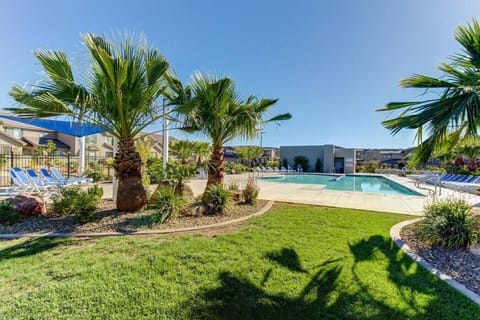 Main Pool heated year round and grassy play area steps away from the front door