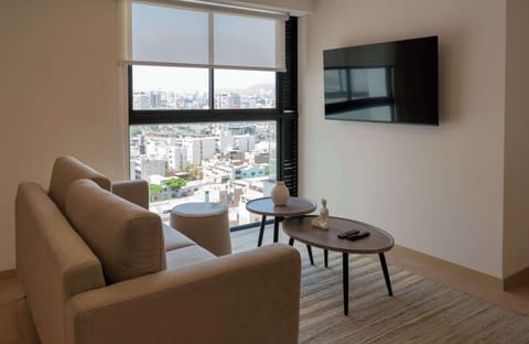 Cozy living room with television.