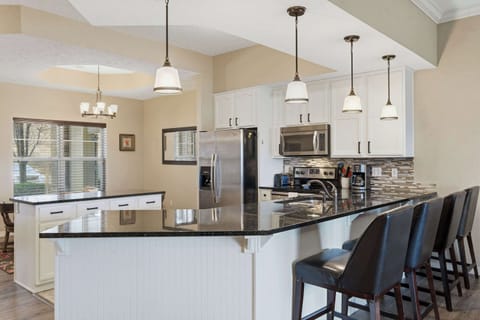 The chic, open kitchen is well equipped for an unforgettable getaway