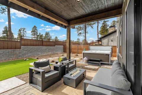 Unwind in Style: Cozy Firepit & Lounge Ready for You!