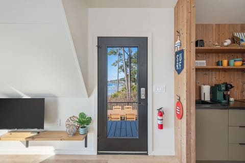 A bright and inviting entryway flowing seamlessly from the living room.