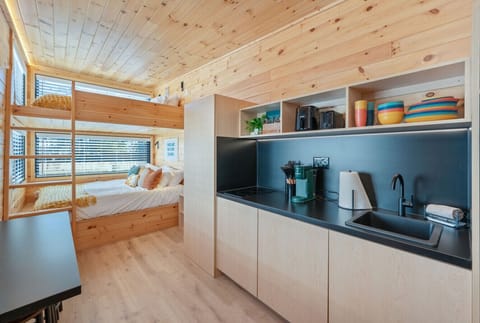 Your perfect cabin retreat—sleep, cook, and relax with ease.