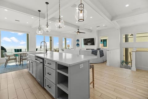 View of Kitchen Island to the Living room