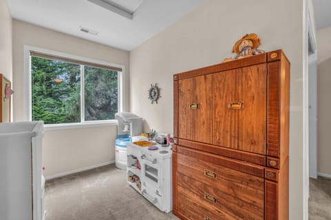 Your little ones will love their dedicated play space with charming toy kitchen and ample storage for all their treasures.