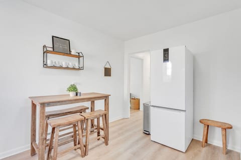 The kitchen is off of the living room.